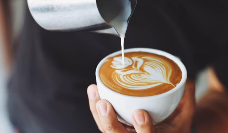 Latte art being poured